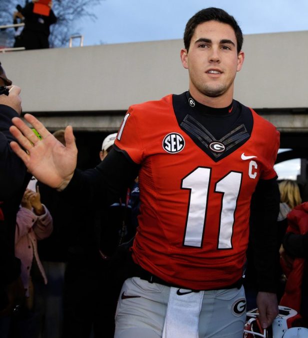 Aaron Murray walks into the stadium before playing Kentucky in 2013.