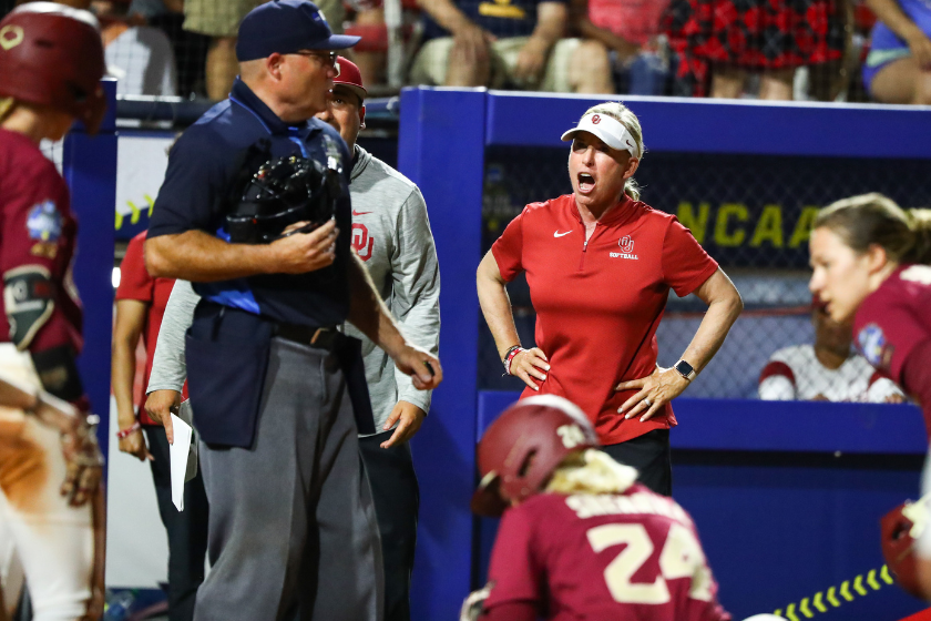 Patty Gasso argues a call during Game 1 of the 2021 Women's College World Series