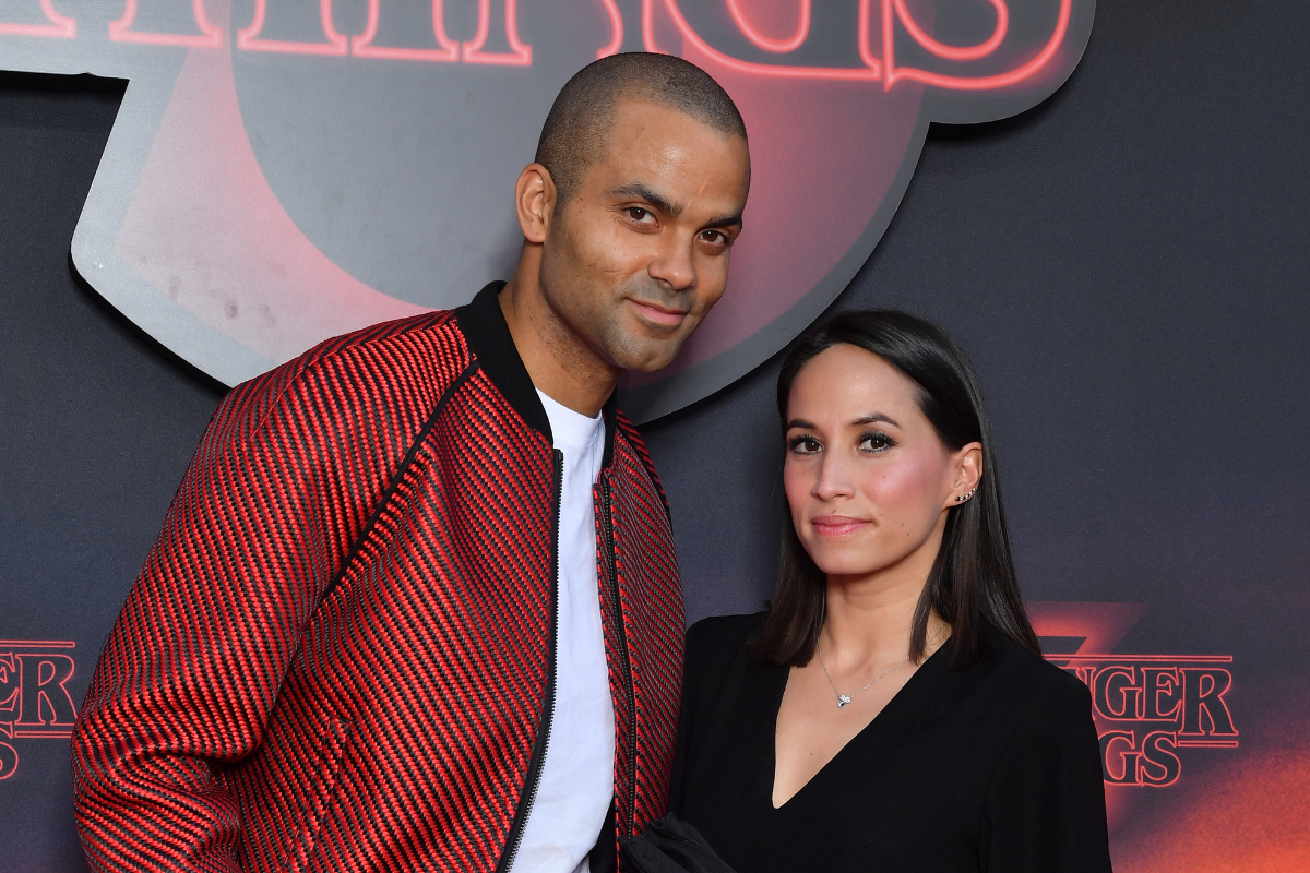 Tony Parker and Axelle Francine pose at the season 3 premiere of Netflix's "Stranger Things" in Paris, France.