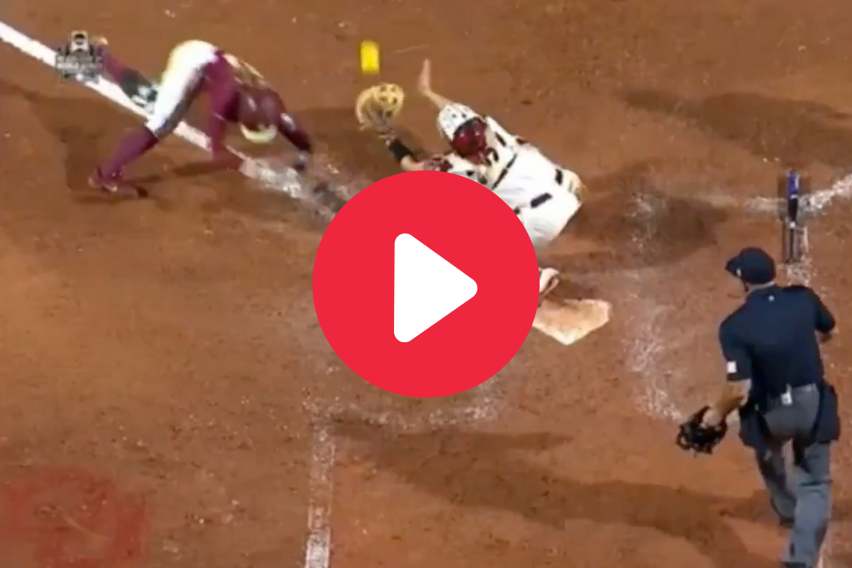 Controversial “Obstruction” Call in WCWS Divides Softball World