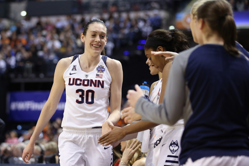 Breanna Stewart gets high-fives from her UConn teammates.