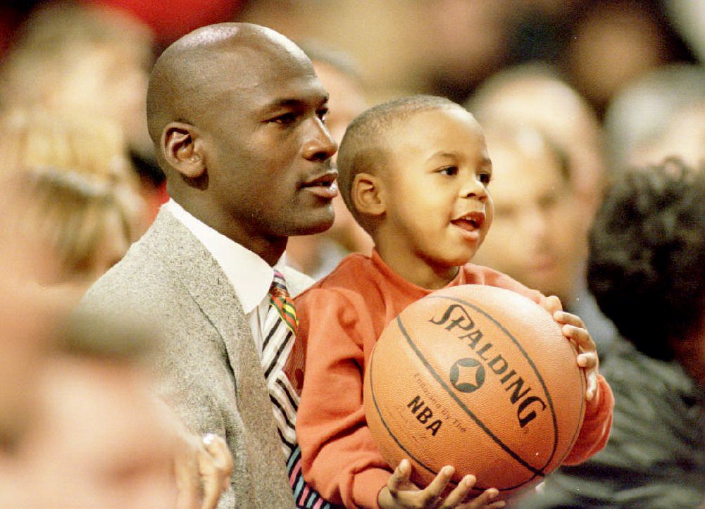 Michael Jordan and his son Marcus before a Chicago Bulls game in 1992.