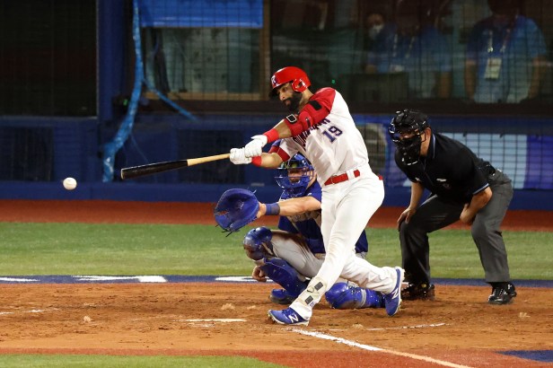 Dominican Republic player Jose Bautista hits the game-winning RBI single against Israel at the 2020 Tokyo Olympics.