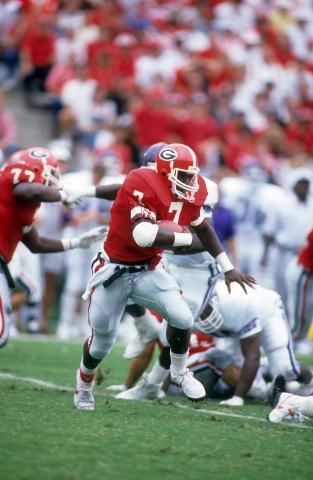 Rodney Hampton runs with the ball during an NCAA game circa 1989 at Sanford Stadium.