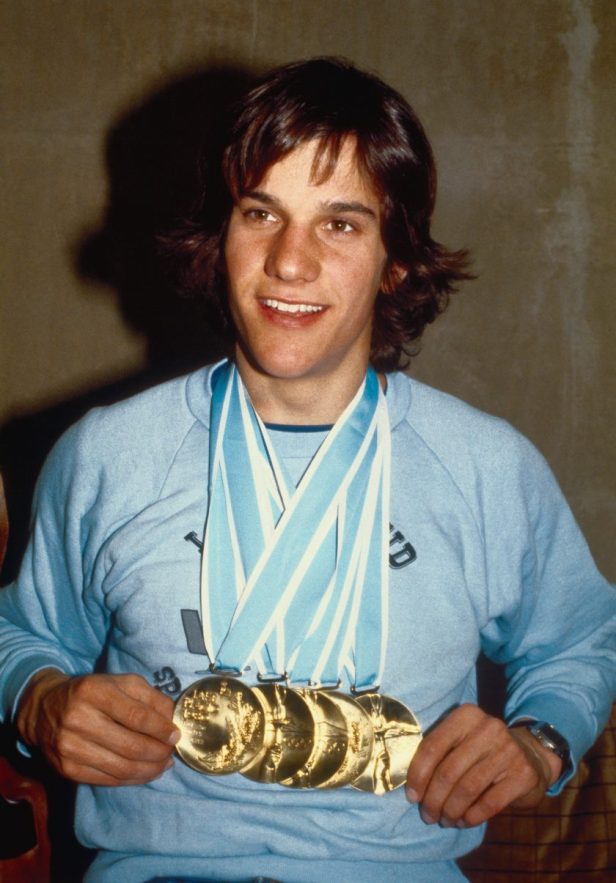 American speedskating star Eric Heiden poses with his record five gold medals in 1980.