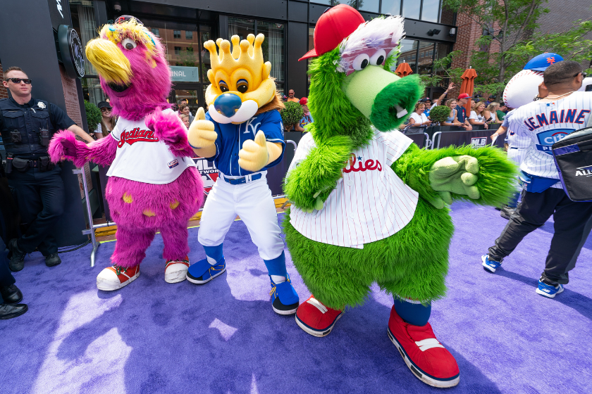 Mascots for the Cleveland Guardians, Kansas City Royals and Philadelphia Phillies walk the purple carpet ahead of the 2021 MLB All Star Game in Denver, Colorado