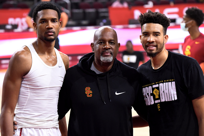 Evan Mobley, Eric Mobley and Isiah Mobley pose for a phot ahead of a Trojans basketball game.