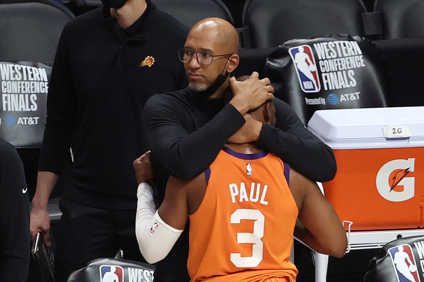 Monty Williams hugs Chris Pail after the Phoneix Suns advance to the 2021 NBA Finals