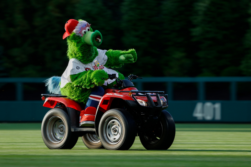 Phillie Phanatic rides his ATV in the Citizen Bank PArk outfield.