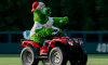 Phillie Phanatic rides his ATV in the Citizen Bank PArk outfield.