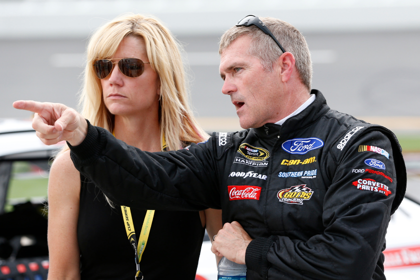 bobby labonte and then fiancee kristin wait during NASCAR Sprint Cup auto racing qualifying at Daytona International Speedway, Friday, July 1, 2016, in Daytona Beach, Florida