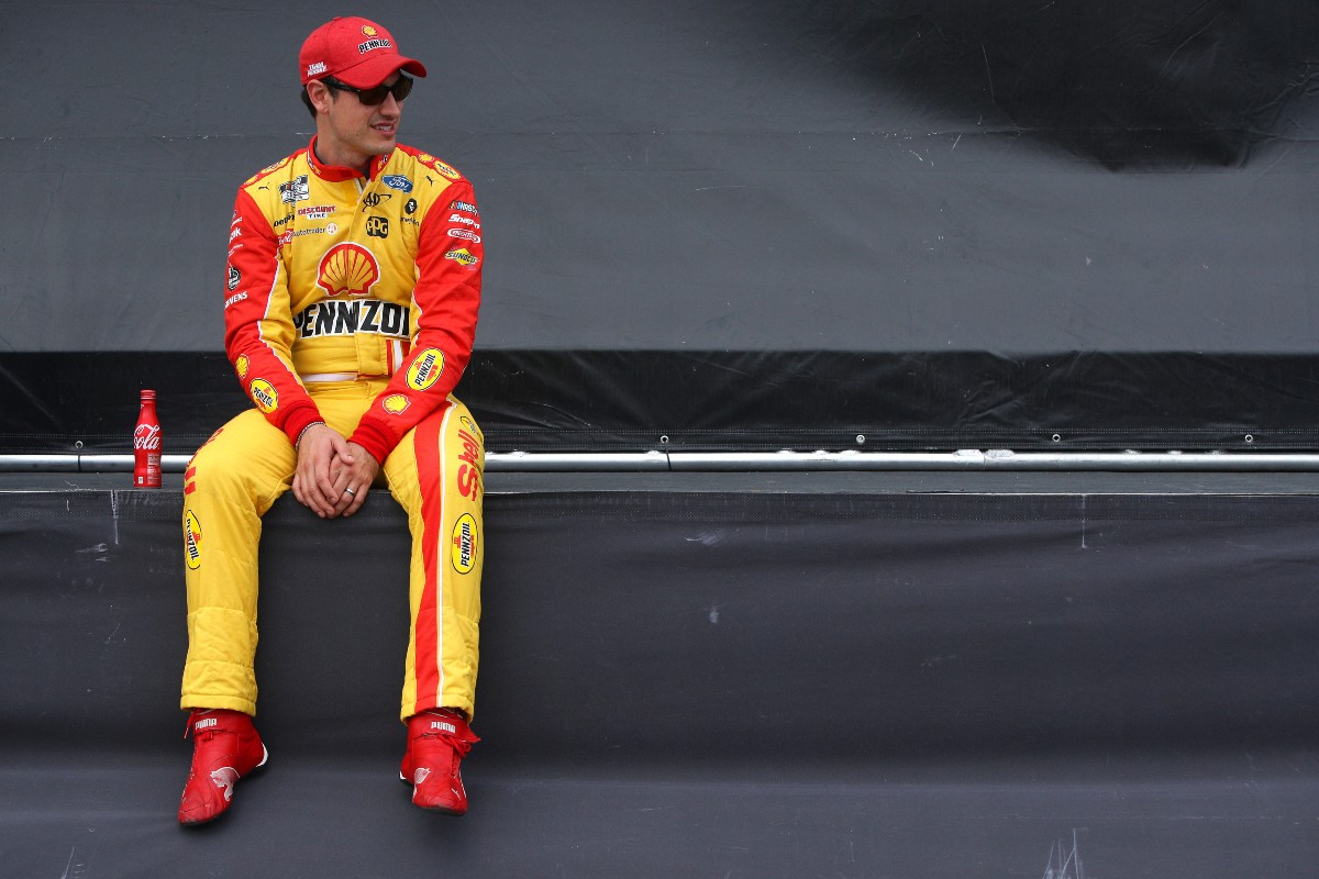 Joey Logano waits backstage during pre-race ceremonies prior to the NASCAR Cup Series Hollywood Casino 400 at Kansas Speedway on October 24, 2021 in Kansas City, Kansas