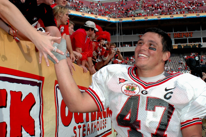 Georgia linebacker David Pollack celebrates victory with fans at the 2005 Outback Bowl