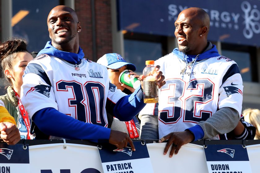 Devin and Jason McCourty celebrate on Cambridge street during the New England Patriots Victory Parade on February 05, 2019.
