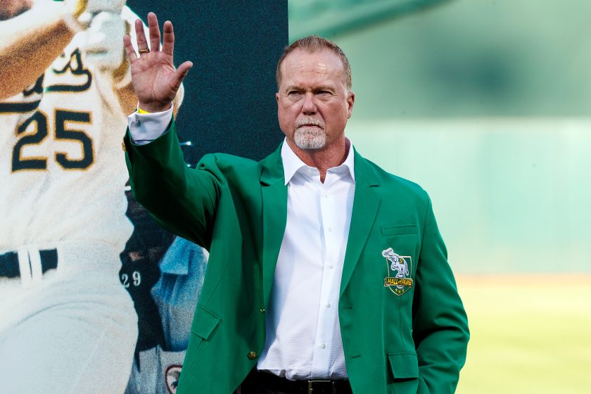 Mark McGwire waves in 2019.