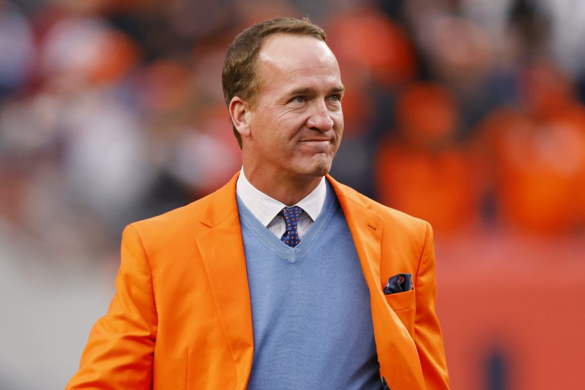 Peyton Manning looks on during a Ring of Honor induction ceremony at halftime of the game between the Washington Football Team and Denver Broncos at Empower Field At Mile High on October 31, 2021.