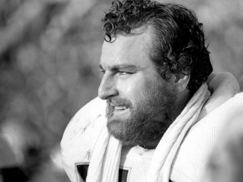 John Matuszak watches the action from the sideline during Super Bowl XI.