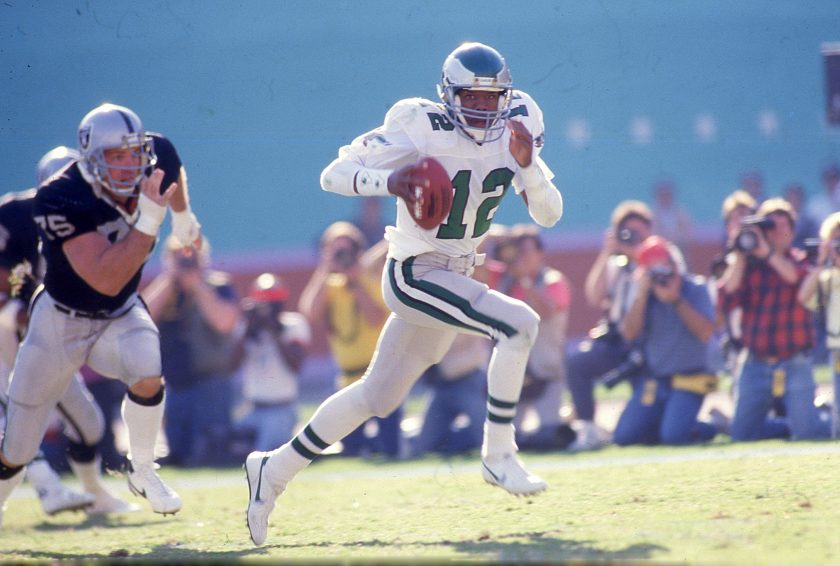 Randall Cunningham of the Philadelphia Eagles circa 1987 scrambles against the Los Angeles Raiders at the Coliseum.
