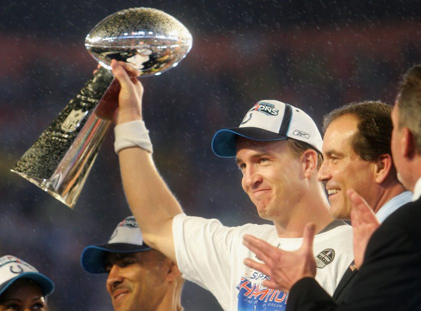 Peyton Manning celebrates with the Vince Lombardi Super Bowl trophy after winning the Super Bowl XLI 29-17 over the Chicago Bears on February 4, 2007.