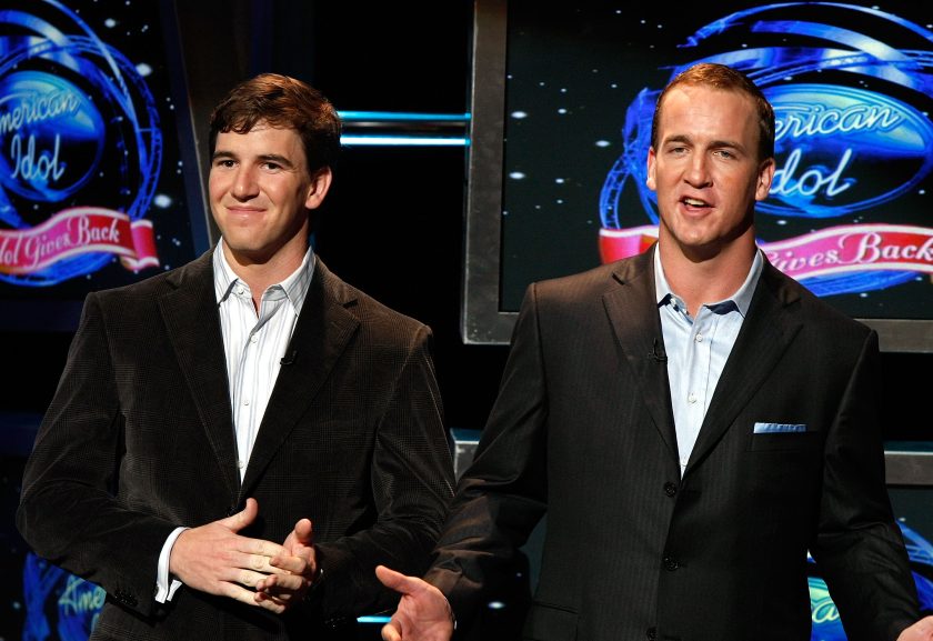 Eli and Peyton Manning speak onstage during the taping of Idol Gives Back held at the Kodak Theatre on April 6, 2008.