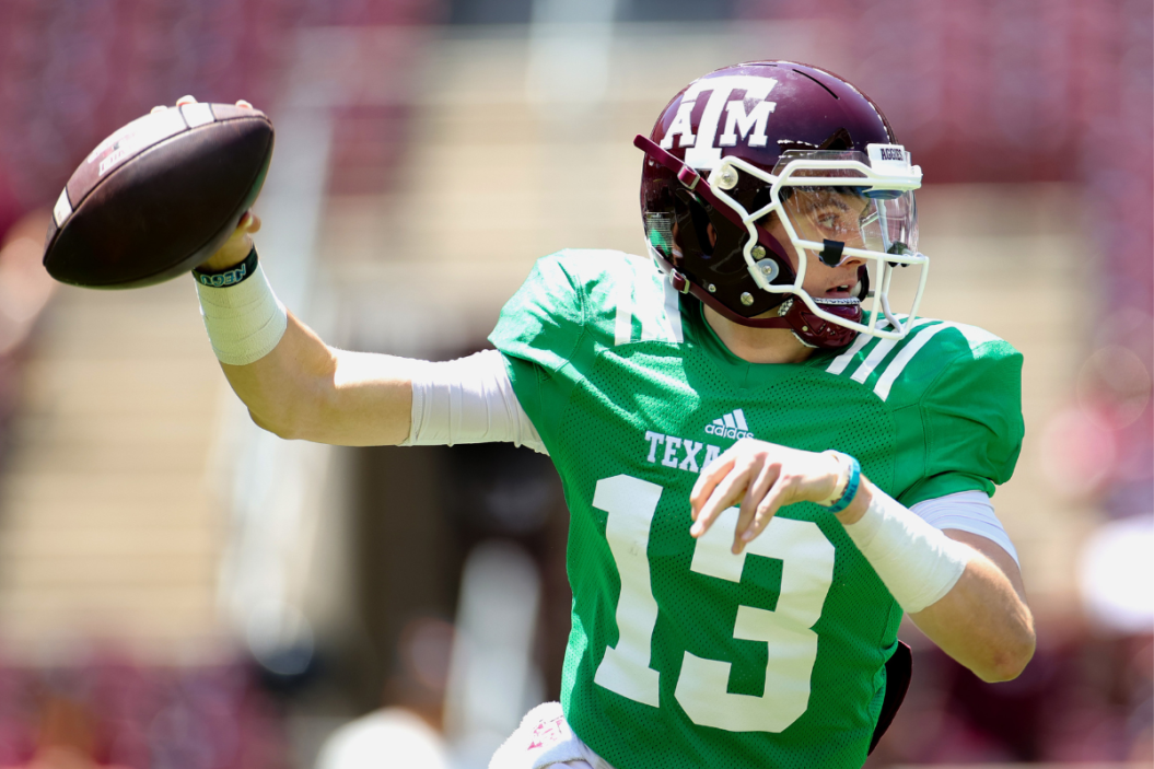 Haynes King #13 of the Texas A&M Aggies throws a pass during the first half of the spring game at Kyle Field