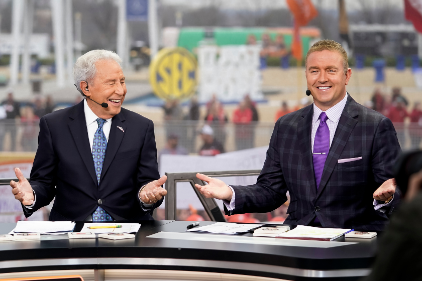 Kirk Herbstreit and Lee Corso smile on the set of ESPN's College Gameday in 2019.
