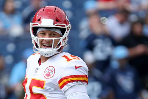 Patrick Mahomes smiles during a Chiefs game.