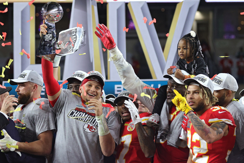 Kanasas City Chiefs QB Patrick Mahomes celebrates winning Super Bowl LIV with his teammates.