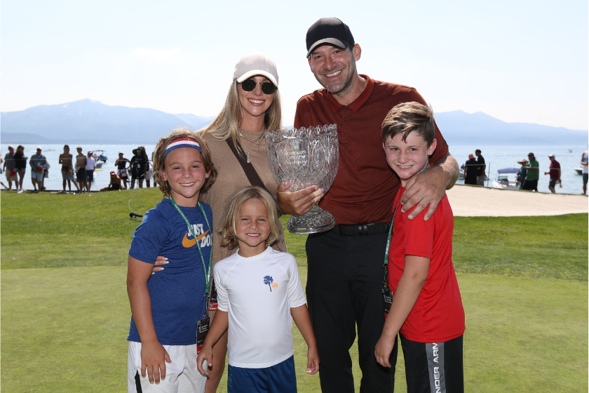 Tony Romo and his family after he won a golf tournament in the summer of 2022.