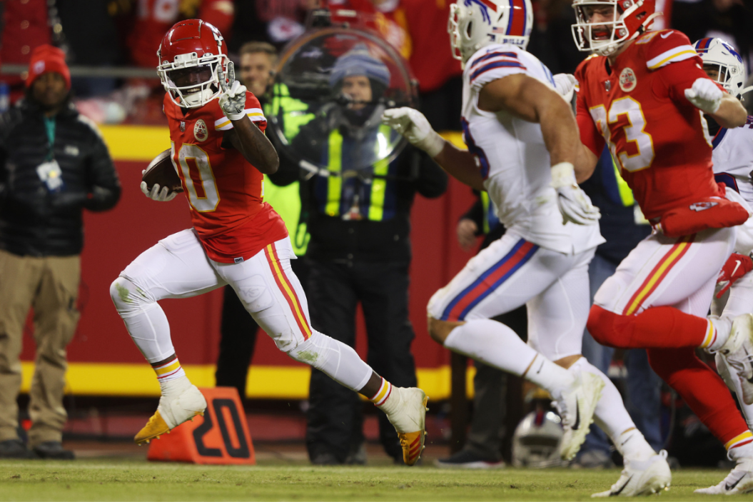 Tyreek Hill races for a touchdown against the Buffalo Bills in a 2022 playoff game.