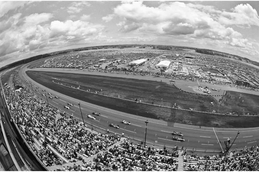 black and white photo of race at michigan international speedway