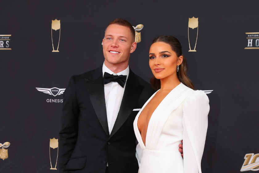 Carolina Panthers running back Christian McCaffrey and Olivia Culpo pose on the Red Carpet poses prior to the NFL Honors 