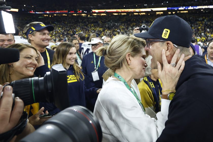 JIm Harbaugh and his wife in 2021.