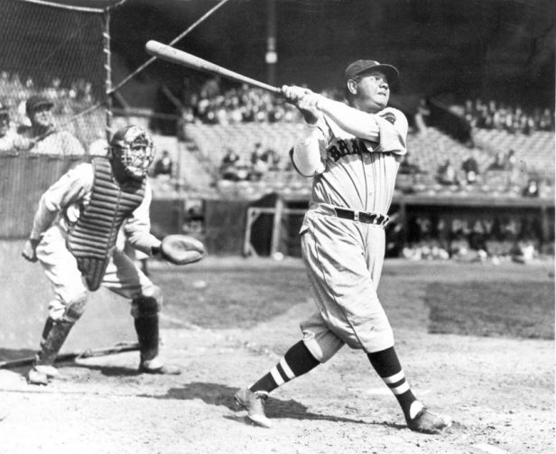 Babe Ruth swings during batting practice.