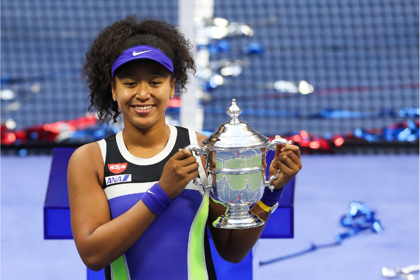 Naomi Osaka poses with the U.S Open trophy after winning the tournament in 2020.