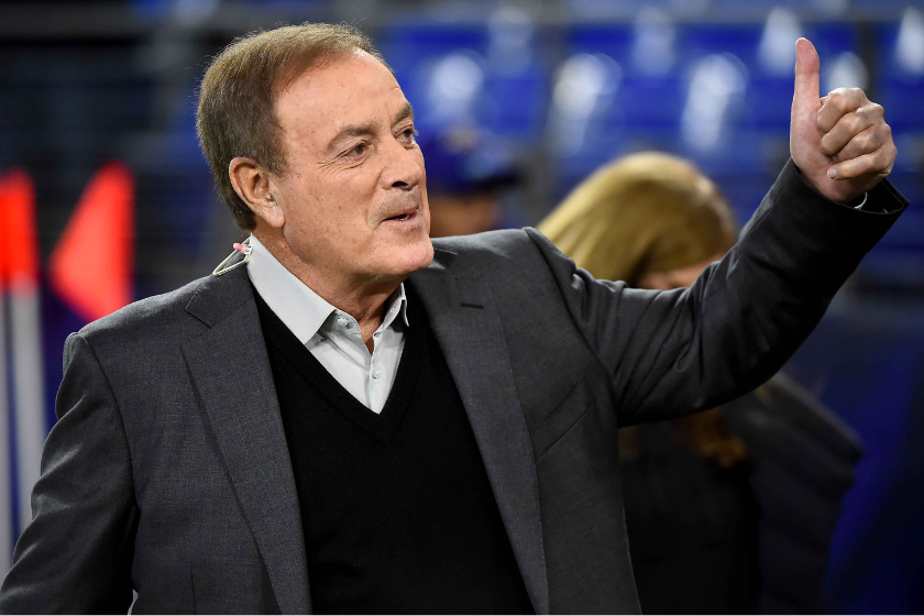 Television broadcaster Al Michaels looks on prior to the game between the Baltimore Ravens and the New England Patriots