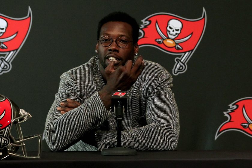 Jason Pierre-Paul holds up his right hand as he speaks to the media on March 23, 2018.