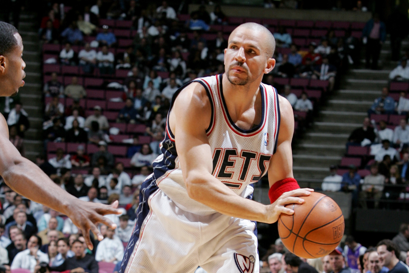Jason Kidd #5 of the New Jersey Nets looks to pass against the Miami Heat in Game three of the Eastern Conference Quarterfinals during the 2005 NBA Playoffs April 28, 2005 at Continental Airline Arena