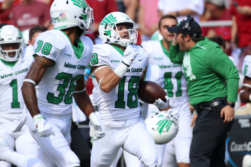  North Texas Mean Green wide receiver Keegan Brewer (18) returns a punt for a touchdown on a fake fair catch during the North Texas Mean Green 44-17 win over the Arkansas Razorbacks