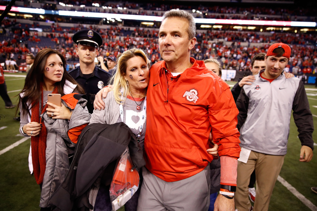 Urban Meyer celebrates with his wife and kids after Ohio State beat Wisconsin in the 2017 Big Ten Championship.