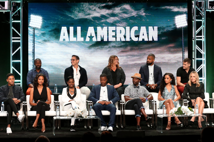 The cast of "All American" hosting a panel
