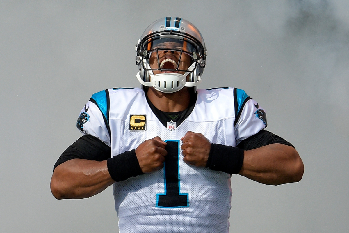 Cam Newton #1 of the Carolina Panthers takes the field against the Dallas Cowboys at Bank of America Stadium