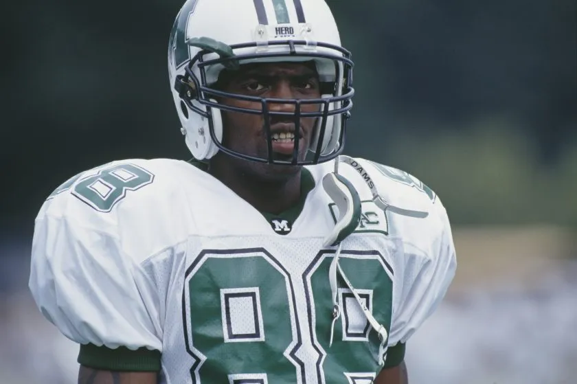 Randy Moss looks on during a Marshall game in 1997.