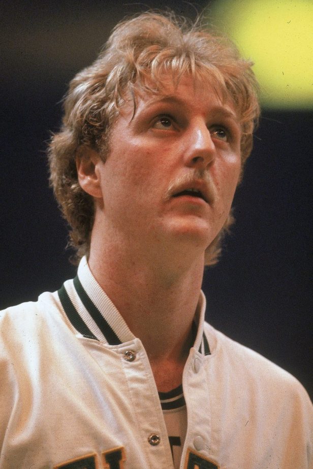 Larry Bird looks on during an NBA game.