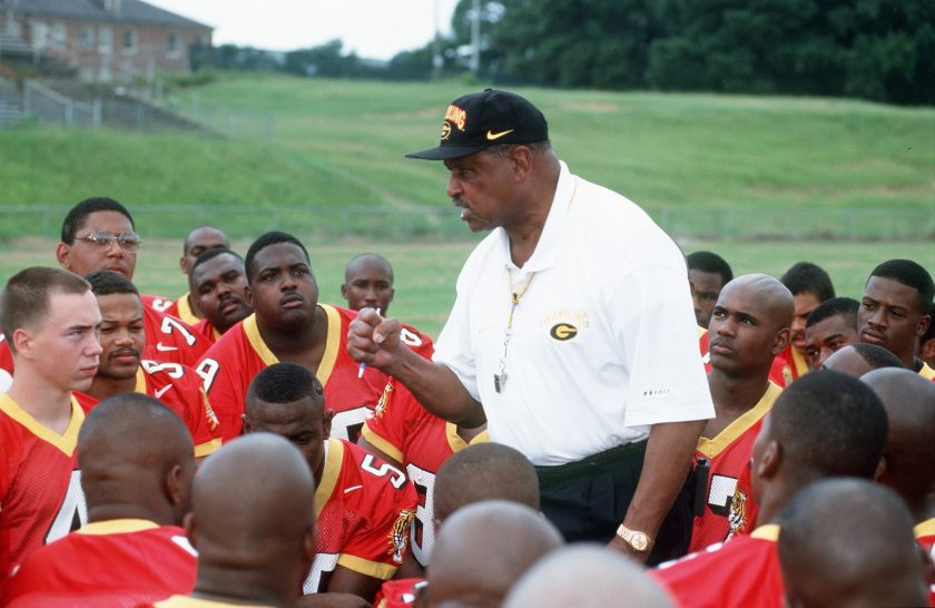 Head Coach Eddie Robinson of Grambling State University talks with his team during Media Day in 1997.
