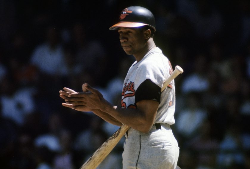 Frank Robinson prepares to hit during a 1960s mlb game.