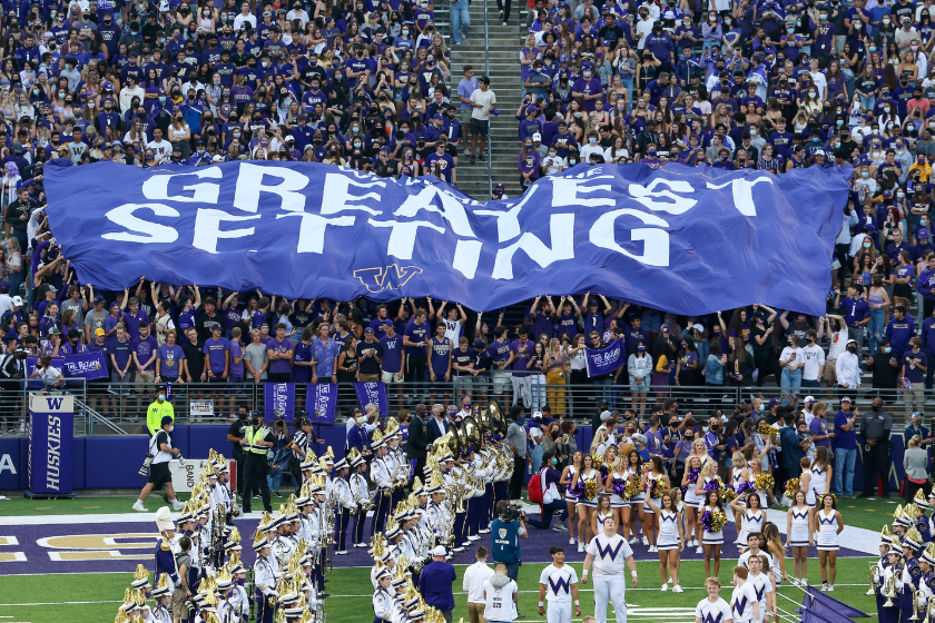 Washington fan held a banner in the stands during a college football game between the University of Washington and the California Bears