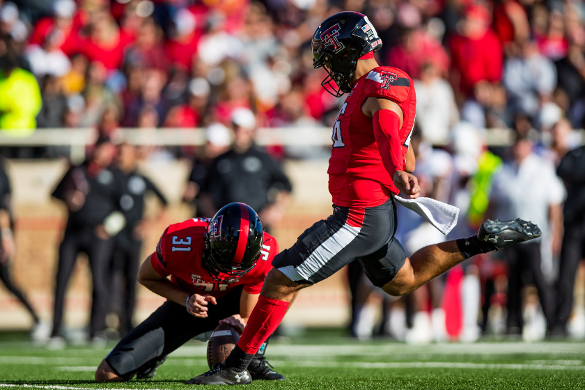 Kicker Jonathan Garibay #46 of the Texas Tech Red Raiders kicks an extra point during the first half of the college football game against the Iowa State Cyclones