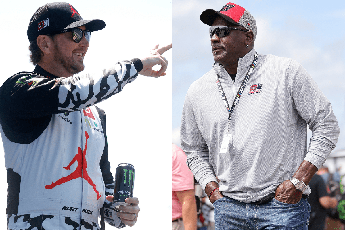 Kurt Busch waves to fans during driver intros prior to the 2022 AdventHealth 400 at Kansas Speedway ; Michael Jordan and co-owner of 23XI Racing walks the grid prior to the 2021 Pocono Organics CBD 325 at Pocono Race
