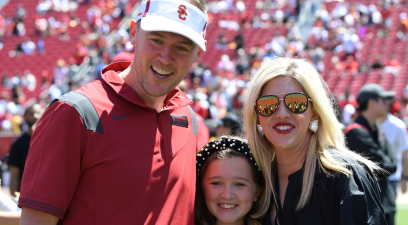 Head coach Lincoln Riley of the USC Trojans takes a photo with his wife and daughters following the 2022 USC Spring Football game